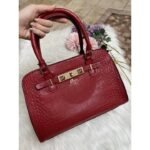 Sharon Croco Handle