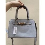 Sharon Croco Handle