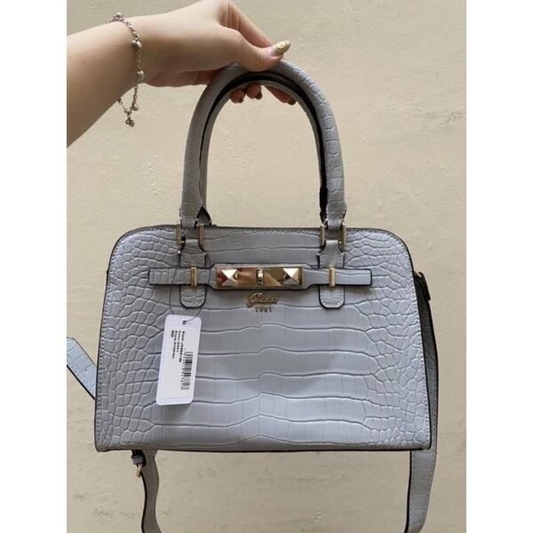 Sharon Croco Handle