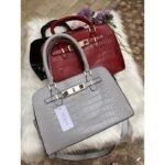Sharon Croco Handle