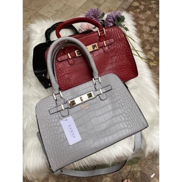Sharon Croco Handle