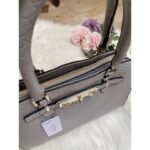 Sharon Croco Handle