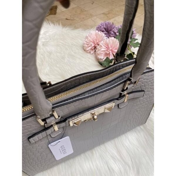 Sharon Croco Handle