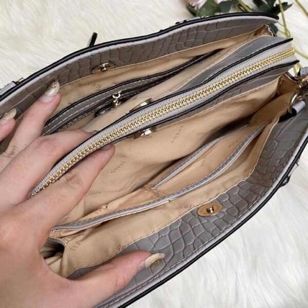 Sharon Croco Handle