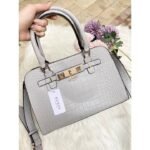 Sharon Croco Handle