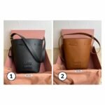 Miu Miu Logo-Embossed Drawstring Bucket Bag
