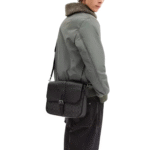 Coach Warner Messenger Bag in Signature Canvas Leather